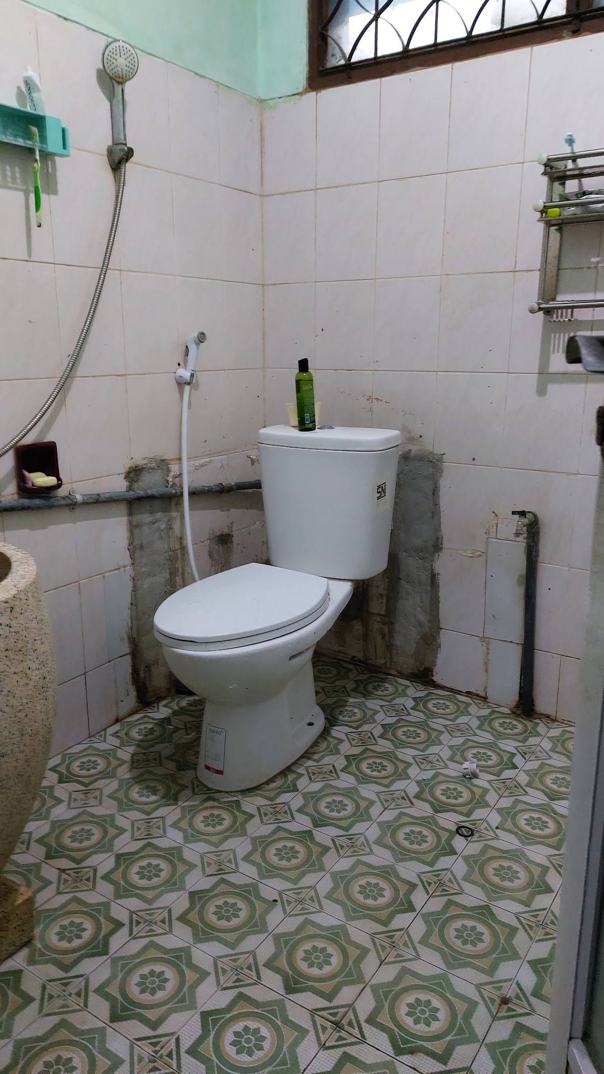 Kost Putra Bu Yeni — kos di surabaya